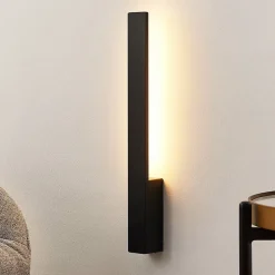 Arcchio Ivano LED-vegglampe, 42,5 cm, svart, metall