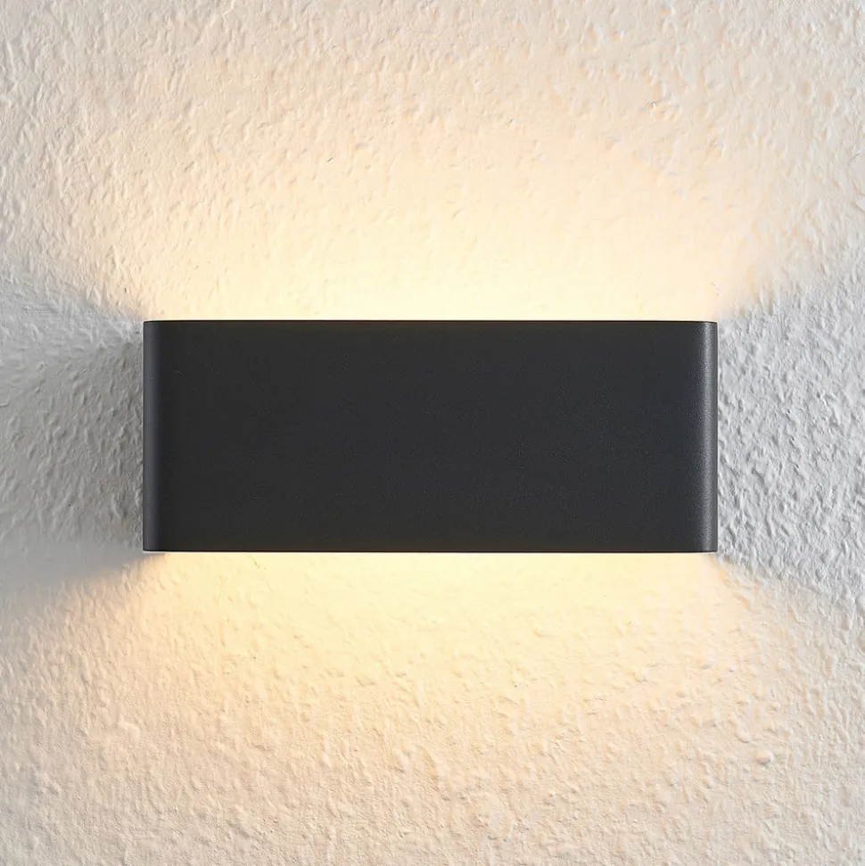 Arcchio LED-vegglampe Karam, 20 cm, svart, metall, opp/ned
