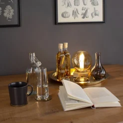 Bordlampe Pluto gull med glasskule krem