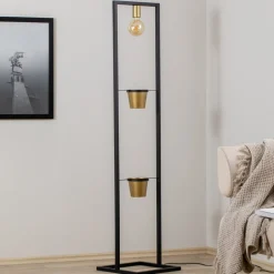 Flores gulvlampe, 1 lyskilde, svart/gull, stål
