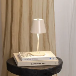 Lindby LED oppladbar bordlampe Janea, CROSS, beige, metall