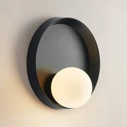 Lucande Andelina vegglampe, rund, svart