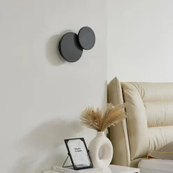 Lucande LED-vegglampe Elrik, svart, 20 cm høy, metall