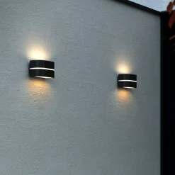 Sibelis utendørs vegglampe, opp/ned, svart, plast, E27