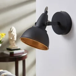 Svart-gyllen vegglampe Julin