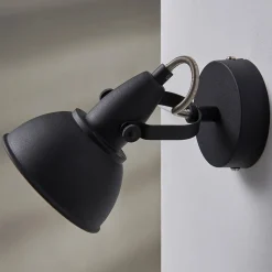 Svart-gyllen vegglampe Julin