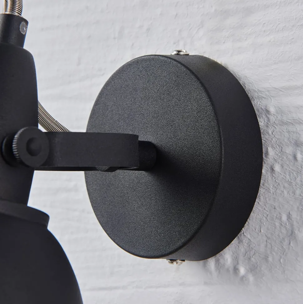 Svart-gyllen vegglampe Julin