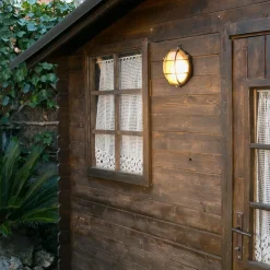 Utendørs vegglampe Noray, messing, Ø 19 cm, IP44