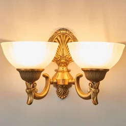 Utsøkt NOAM vegglampe med bronse