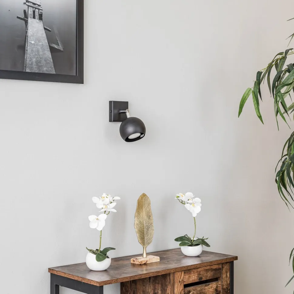 Veggspot Flame i stål, svart